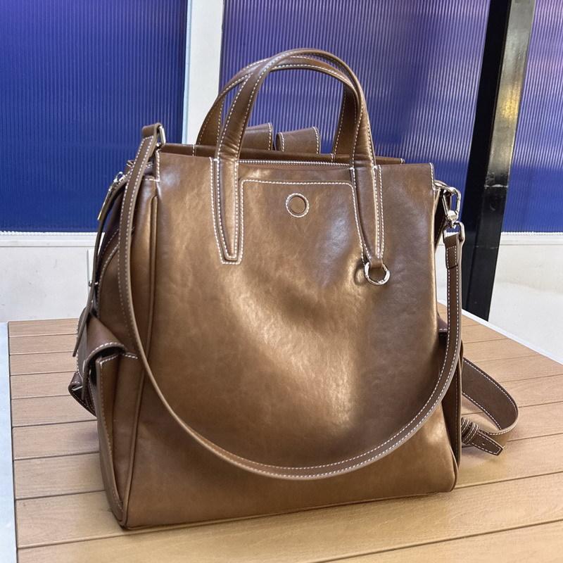 Nova mochila de couro de vaca unissex bolsa para o dia a dia bolsa para computador bolsa de grande capacidade feminina
