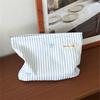 Blue and White Striped Bow Embroidered Makeup Bag, Zippered Storage Bag, Portable Travel Cosmetics and Skincare Storage Bag