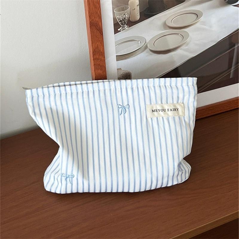 Blue and White Striped Bow Embroidered Makeup Bag, Zippered Storage Bag, Portable Travel Cosmetics and Skincare Storage Bag