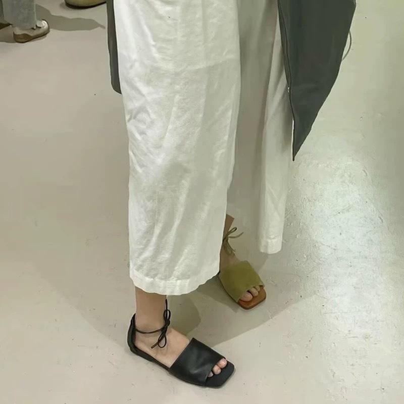 Cowhide version~ niche open-toe one-word sandals women's flat-bottomed strap bag and half slippers for outer wear