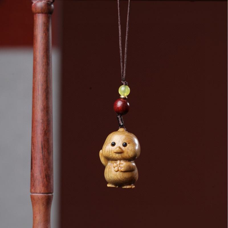 Twelve Zodiac Animal Charms Green Sandalwood Set: Rat, Ox, Tiger, Rabbit, Dragon, Snake, Horse, Sheep, Monkey, Rooster, Dog, Pig.