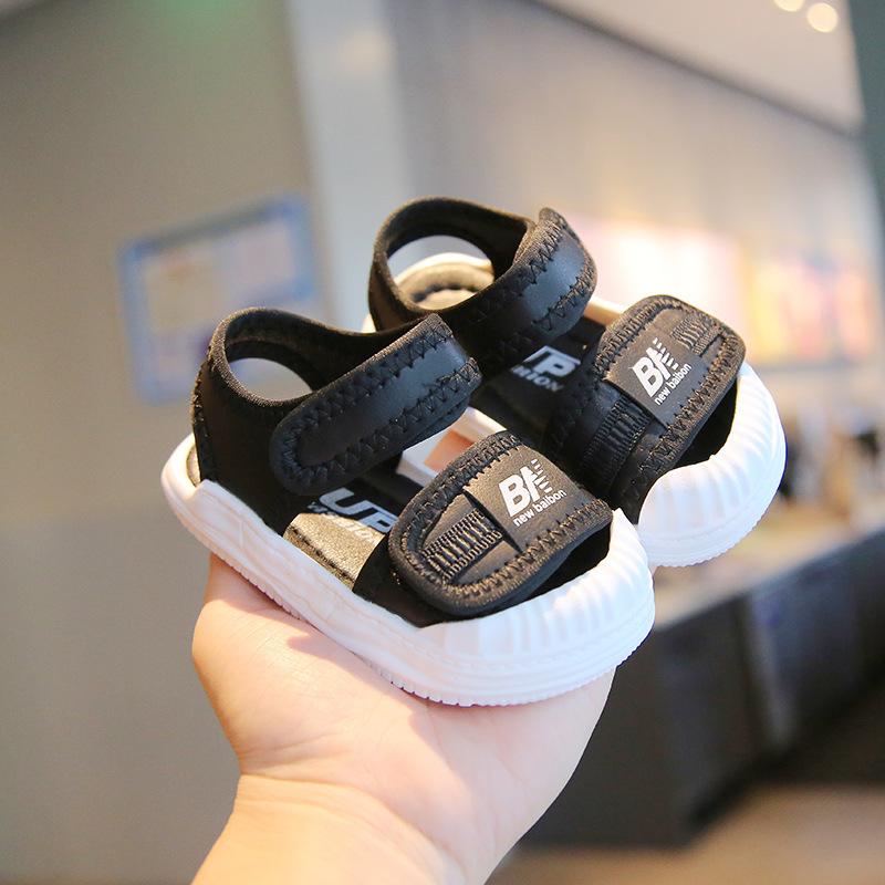 

0-1-3 year old baby toddler sandals Korean version baby shoes soft sole baby shoes bag head beach shoes 20 чёрный