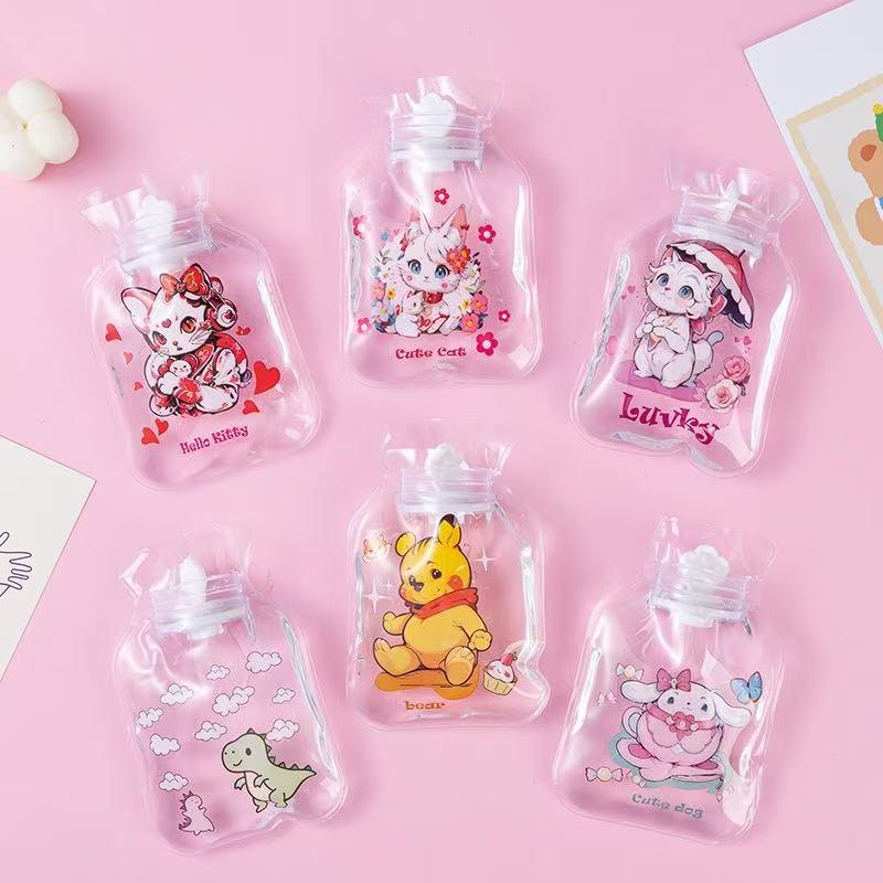 

Hello Kitty Cartoon Portable Hand Warmer: A Cute and Transparent Hot Water Bottle for Students. 10.5*17 cm (200ml)