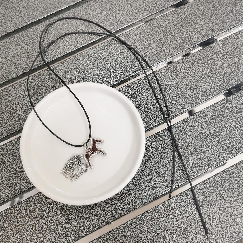 Retro Tassel Pendant Necklace - Trendy Cool Style for Unique Sweater Chain Look