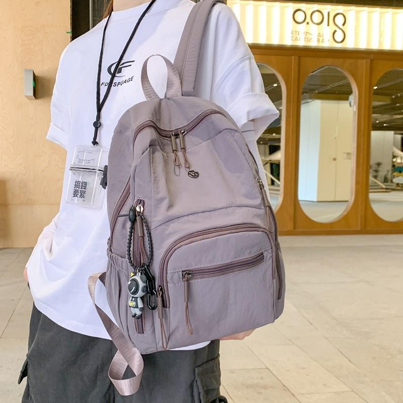 Lightweight schoolbag female solid color water-proof multi-pocket computer commuting backpack college student class travel backpack