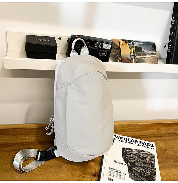 New casual outdoor travel bag lightweight men's and women's portable messenger bag anti-splashing simple sports backpack