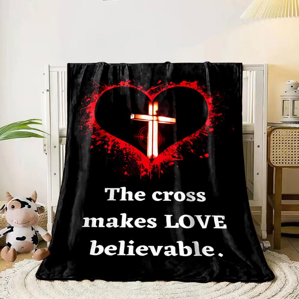 

A glowing cross inside a red, splattered heart on a black background. for all seasons blanket lunch break throw gift 80cm x 120cm