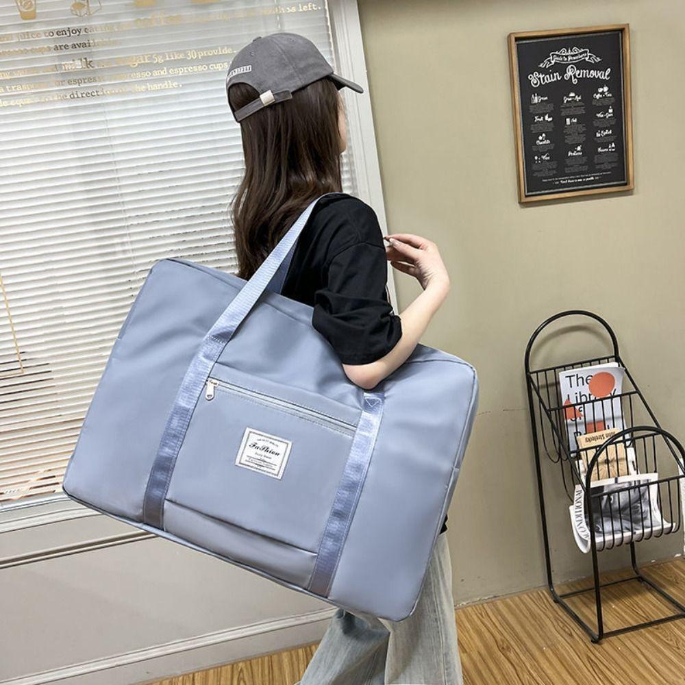 Große Kapazität Reisegepäcktasche Faltbare Reisehandtaschen Tragbare Reiseaufbewahrungstasche Kleidersack