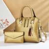 Taizhou Women's Bag Fashion Crocodile Pattern Mother and Child Bag Large Capacity Explosion Women's Bag Fringed Pendant Portable Messenger Bag