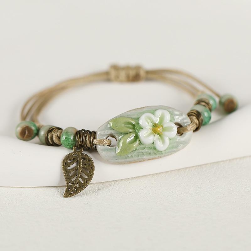 Retro ceramic flower woven bracelet niche literary hand rope small fresh bell bracelet female