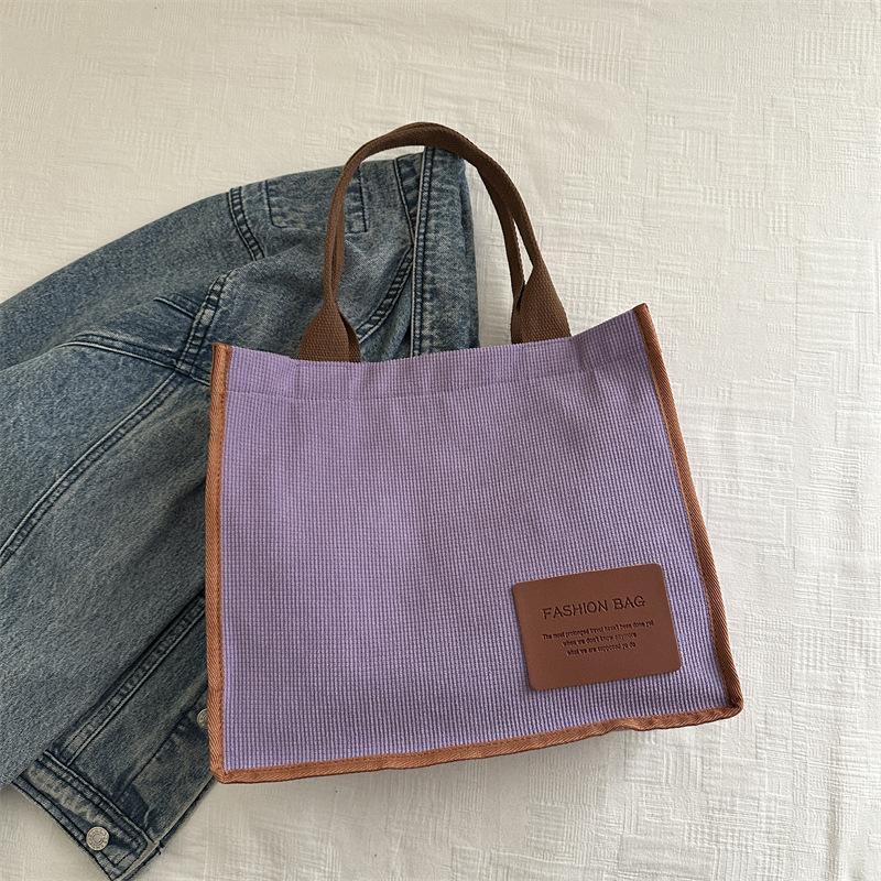 2025 summer new literary and artistic large-capacity class shoulder portable messenger bag casual simple canvas women's bag