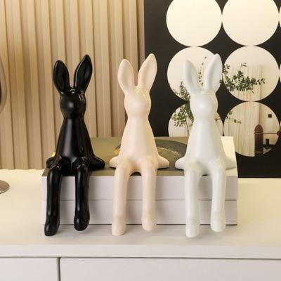 Sitzende Hasenstatue Beflockte Hasenfigur Osterhasen-Dekoration für Wohnzimmer-Schrank