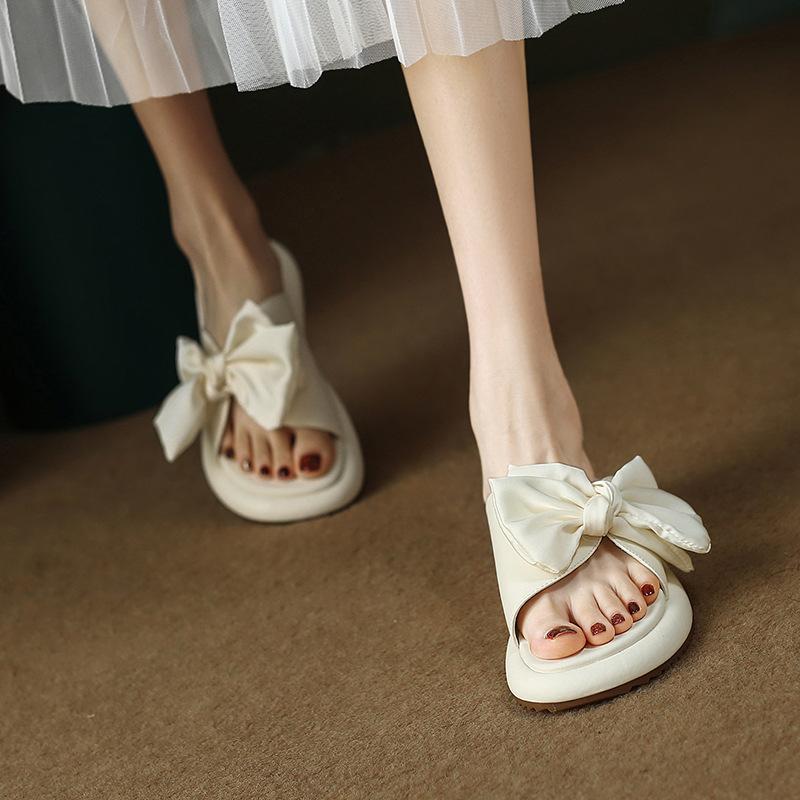 

Huge and lightweight~ Small thick-soled bow one-word slippers for women s 2025 summer outdoor sandals 35