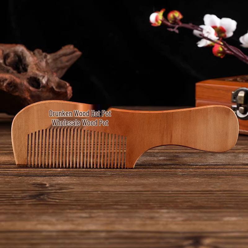 

Антистатическая расческа из грушевого и персикового дерева: Предотвращение выпадения волос для всех полов