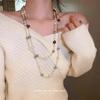 Elegant Pearl Four-Leaf Clover Women's Necklace - Versatile Layered Sweater Chain for Autumn/Winter