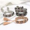 European Woven Bracelet with Metal Nail Buckle and Tassel for Women