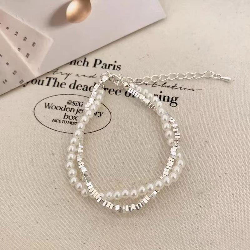 Womens Bracelet Pearl With Irregular Silver Beads And Tassel Accents For A Look Classy