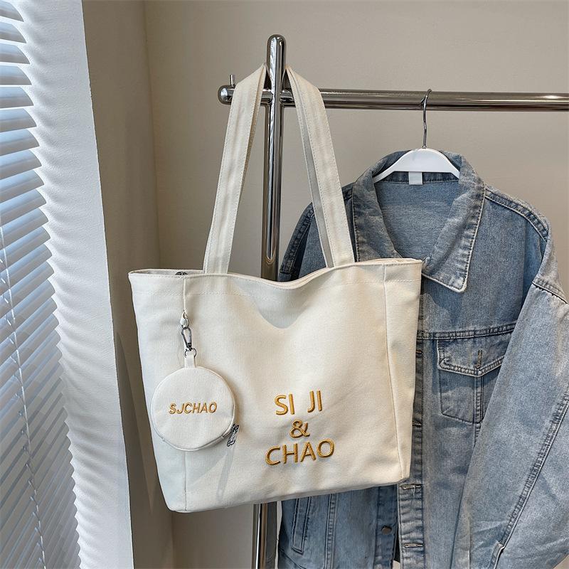 Women's Large-capacity Canvas Bag, Simple Letters, Versatile Commuting Artifact.