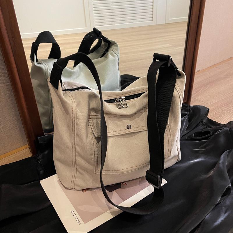 

Холщовая сумка женская большой вместимости новая осенне-зимняя универсальная на плечо сумка-мессенджер для учебы и работы сумка-тоут покинуть белый