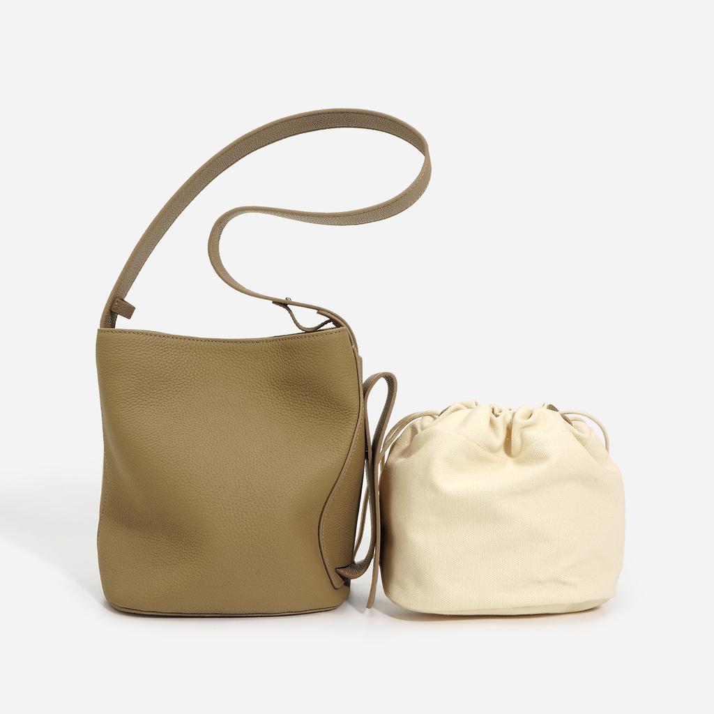 Luxuriöse Eimerhandtasche aus echtem Leder für Damen, klassisches strukturiertes Knebeldesign, Pendler-Umhängetaschen