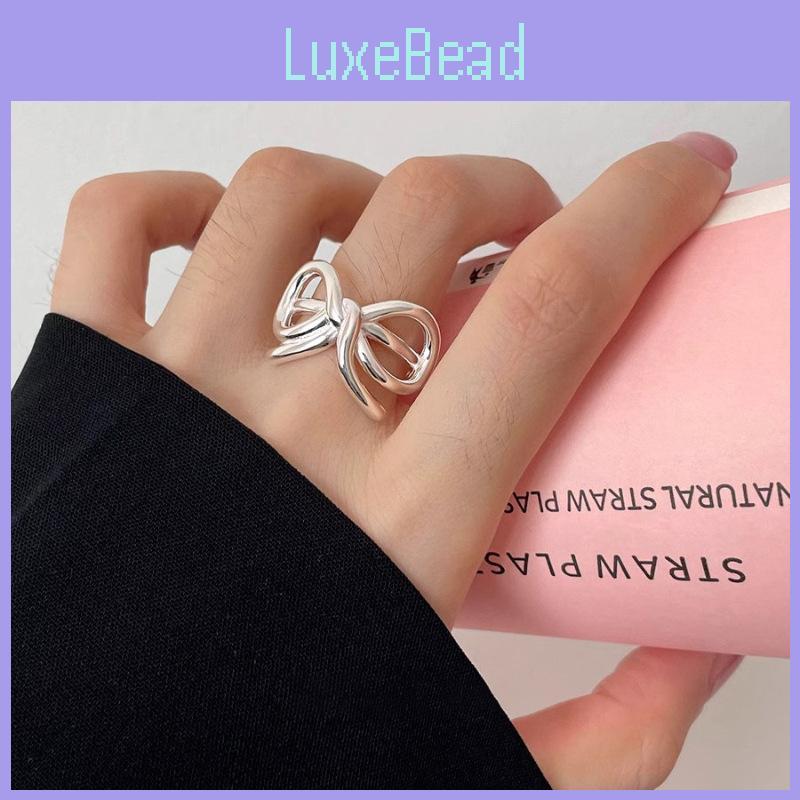Elegant Open Adjustable Copper Bowknot Ring For Women With Unique Geometric Design
