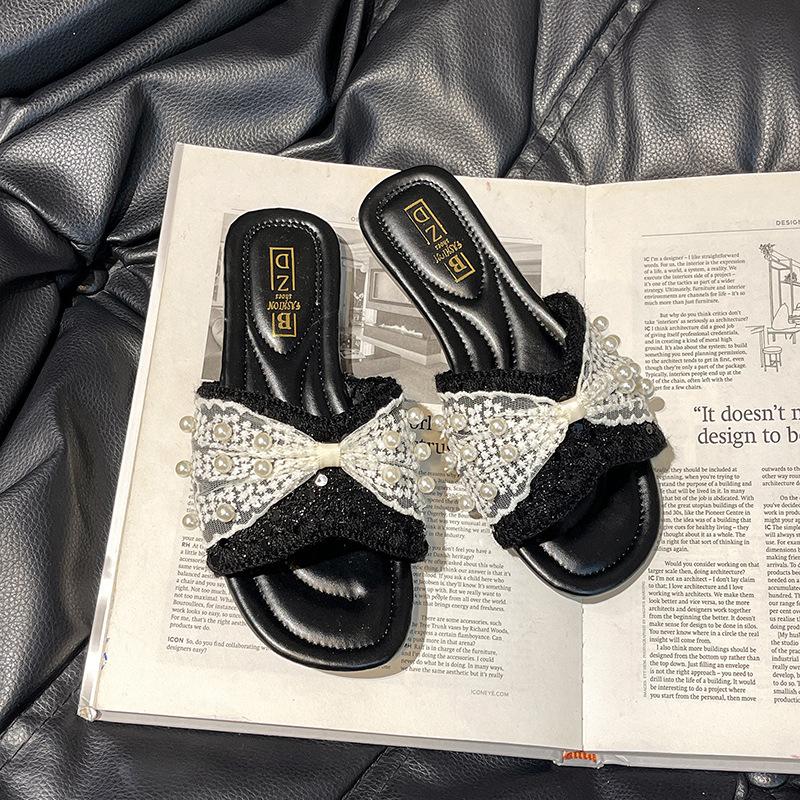 

Xiaoxiangfeng French flat-bottomed cool slippers women s outer wear 2025 summer new models with skirts fashion bows one-word drag 35