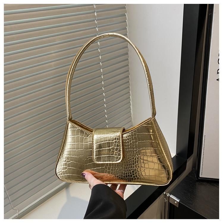 Trendlinie Nischen-Baguette-Tasche modische und einfache Schulter-Achseltasche Damen 2025 Frühling neue Umhängetasche Damentasche