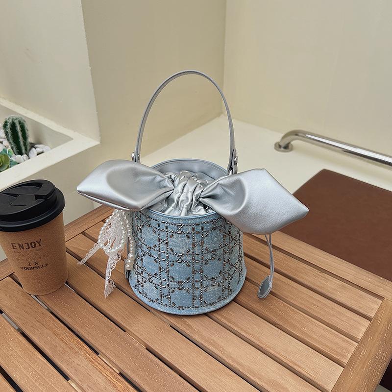 2025 einfache Umhängetasche Pendler Textur ausländischer Stil neue Schleife Messenger Bag Koreanische Version einfach tragbare Bucket Bag