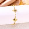 Elegant Four-Leaf Clover Titanium Bracelet with Micro-Paved Diamonds - Light Luxury Women's Floral Jewelry