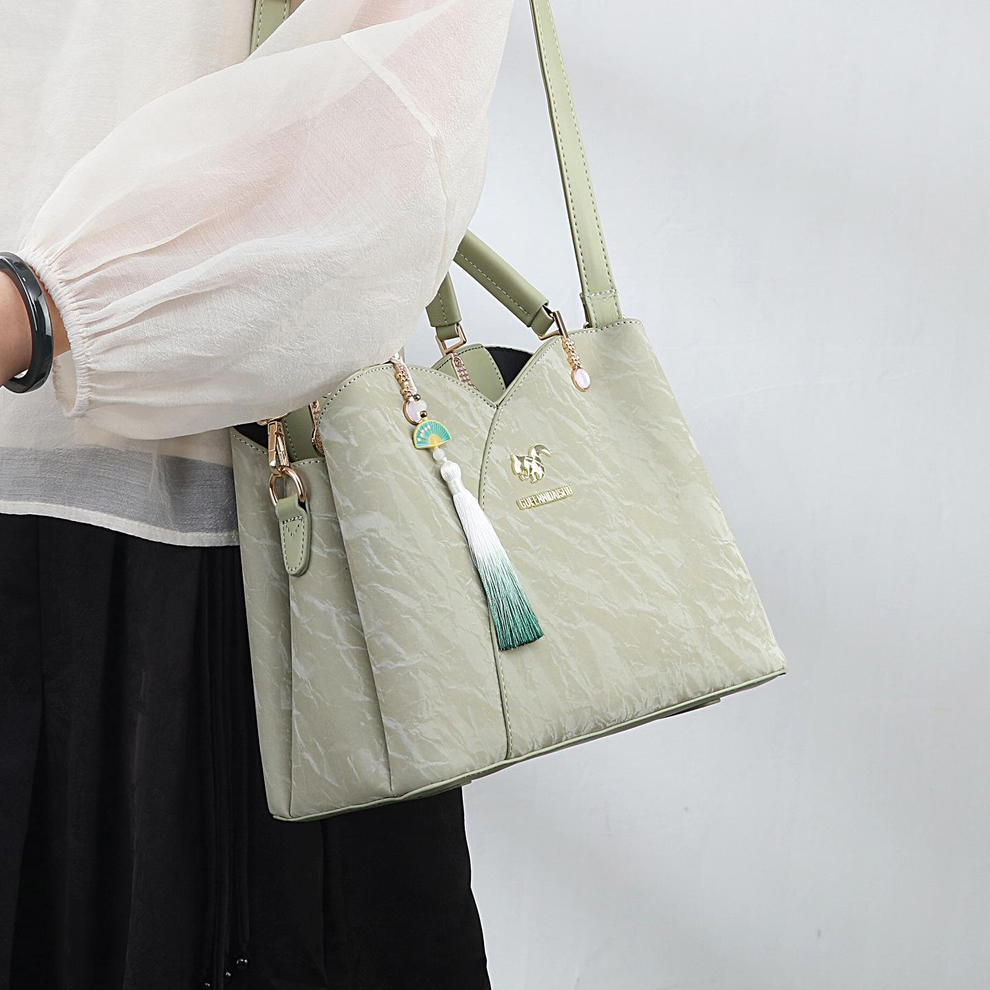 

New Chinese style national style bag women s 2025 spring and summer new high-end temperament portable messenger bride mother bag