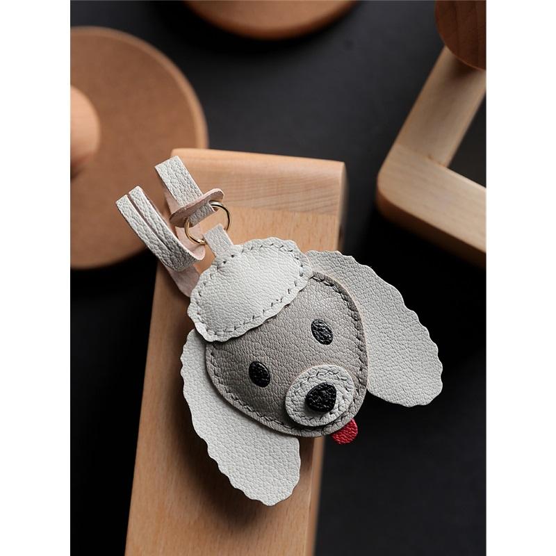 Porte-clés chien mignon en cuir véritable accessoire pour voiture et décoration de sac à main