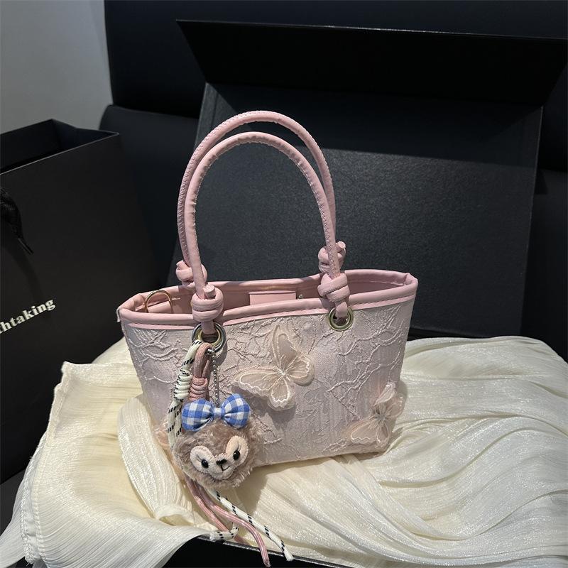 Super fire niche embroidered bag women's 2025 new summer versatile messenger bag fashionable portable bucket bag