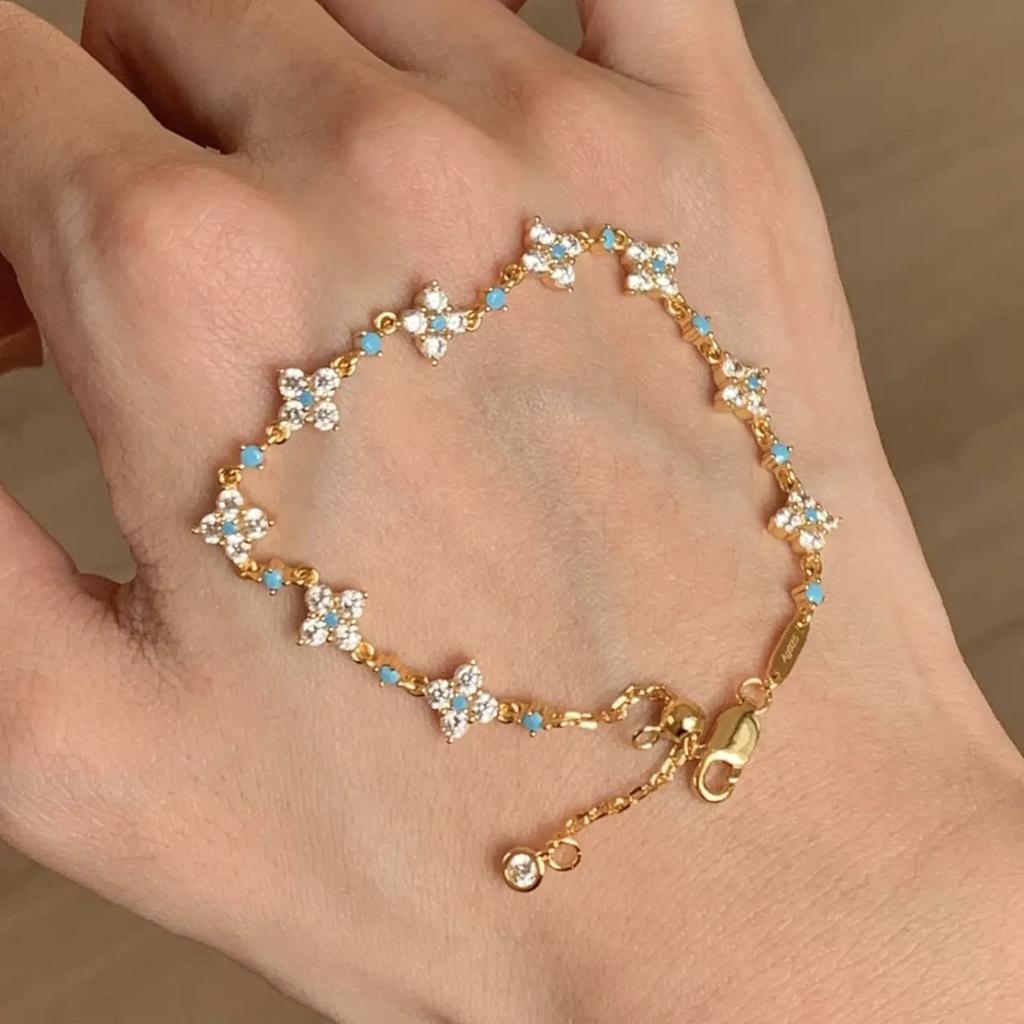 French vintage blue turquoise zircon four-leaf clover full-diamond bracelet for women, floral design, high-end niche fashion, light luxury jewelry