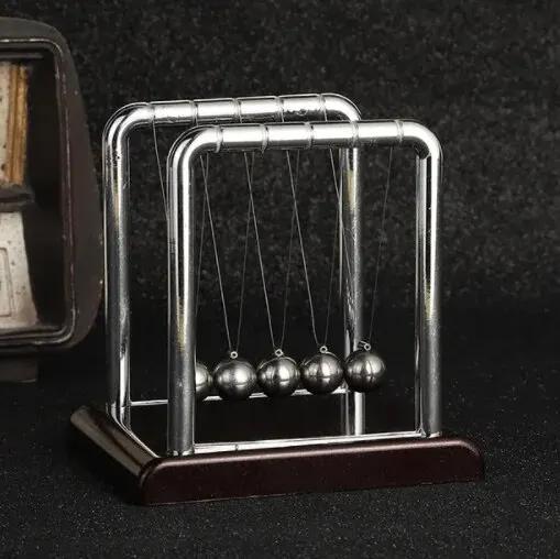 Newtons Cradle Balance Stålkule Undervisningsmateriell Fysikk Vitenskap Pendel Skrivebordsleker Stressavlastningsgaver Hjemmedekorasjon