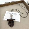 Retro Ethnic Ceramic Wood Necklace: Geometric Fruit Pendant for Women