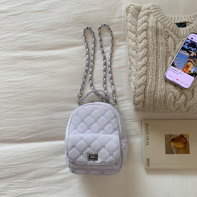 

Korean version of fashion handbag women s niche high-value women s backpack 2025 autumn new diamond chain backpack лавандовый