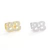 Unique Number 23 Shape Brass Two Tooth Grills Iced Zircon Gold Plated Body Jewelry for Engagement or Anniversary
