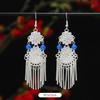 Miao Yin earrings original niche retro Dongling jade earrings long fringed earrings women