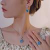 Schmuck Kupferboden Vergoldet Simulation Millennium-Schliff Meerblau Rund Retro Set Hauptstein 12 mm