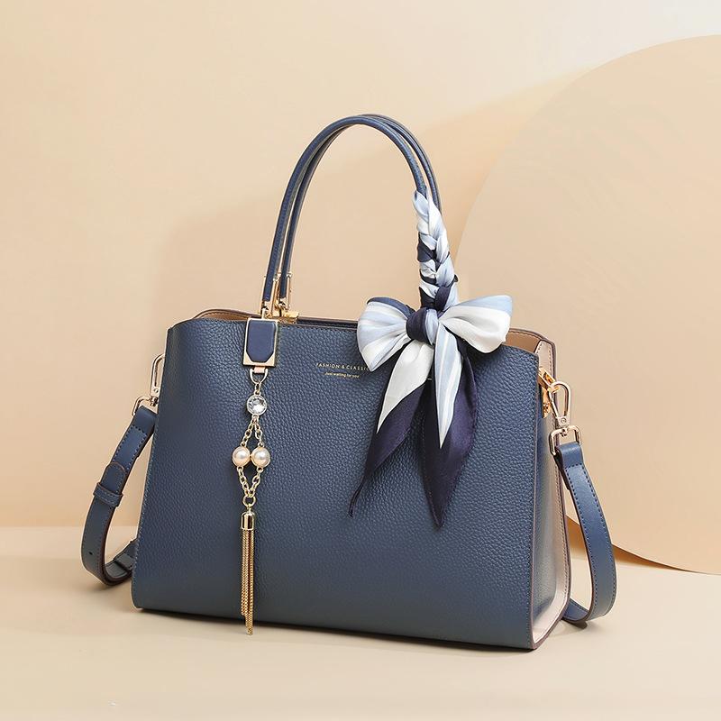 

Новая сумка для поездок на работу, универсальная портативная сумка через плечо, большая вместимость, легкая роскошная сумка для мам