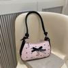 Niche design bow underarm bag women's 2025 new handbag fashion shoulder messenger bag sweet baguette bag