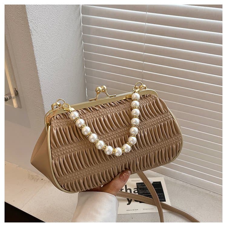 Folded mouth gold bag women's light luxury pearl handbag