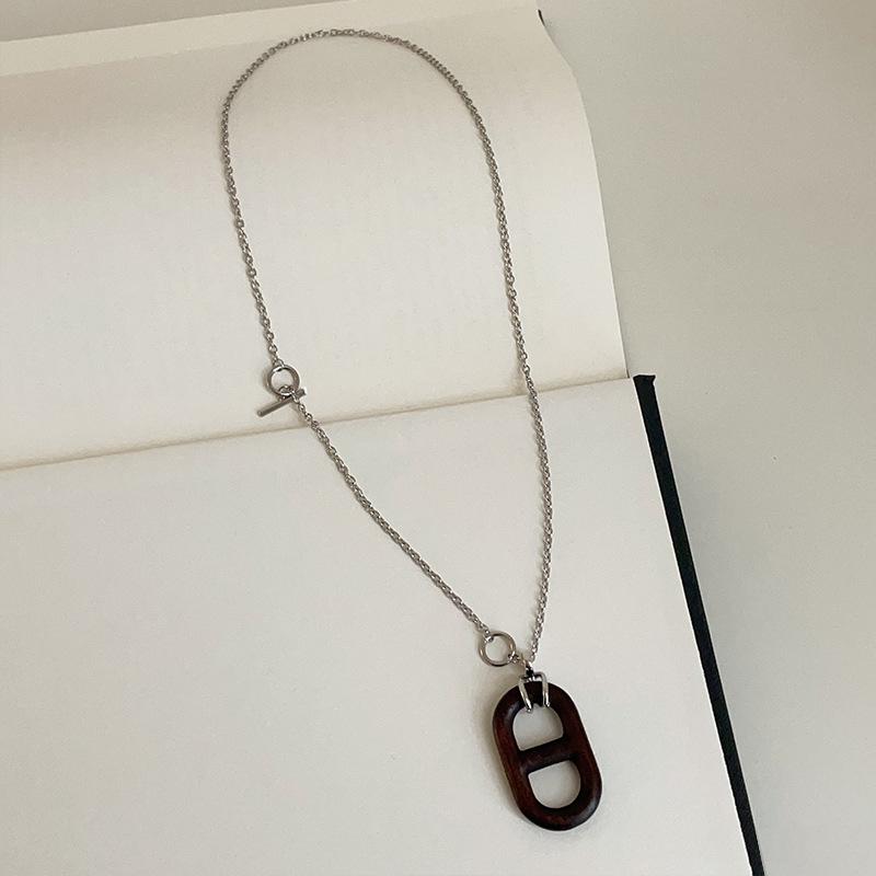 

Niche High-End Деревянное ожерелье в виде свиного носа Женское легкое роскошное ретро индивидуальное трендовое Универсальное шейное ожерелье для свитера