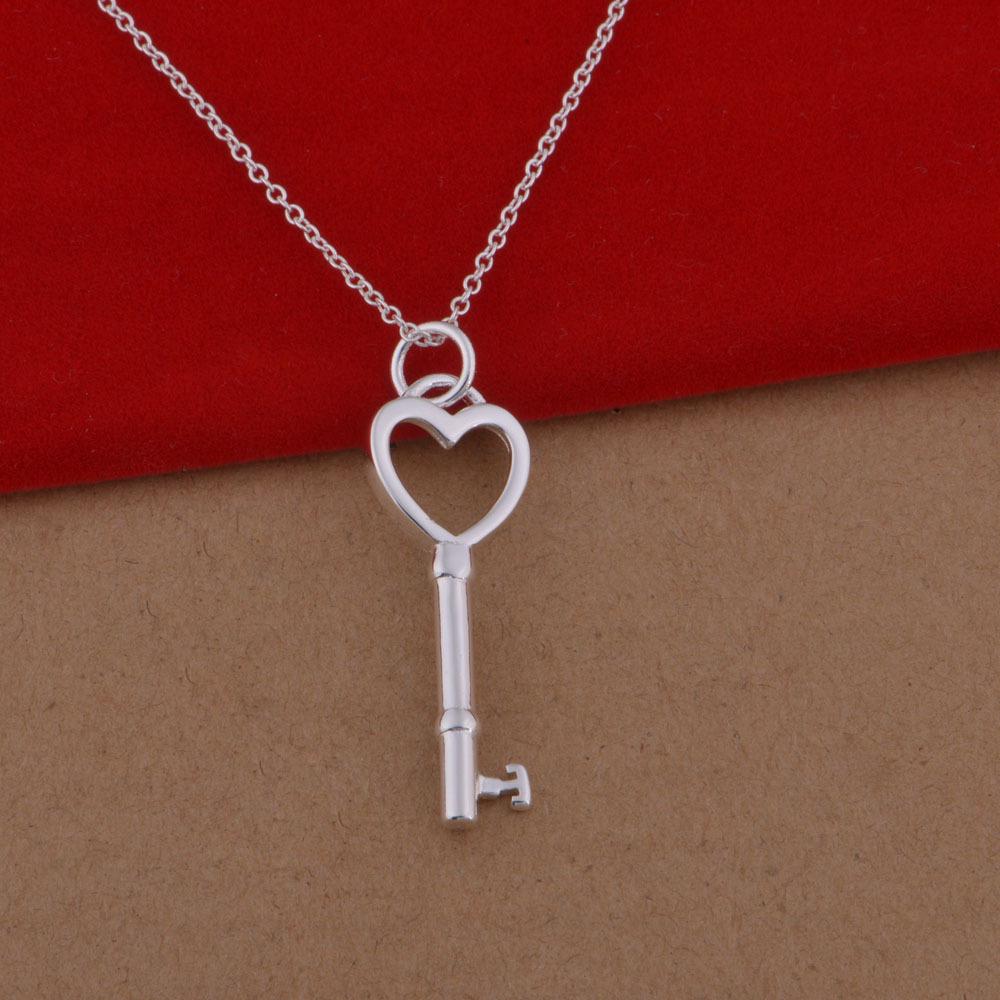 European and American Fashion 925 Sterling Silver Heart Key Necklace and Earrings Set.