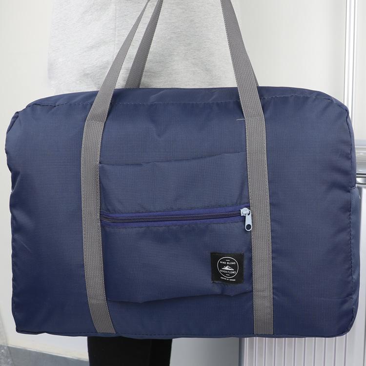 Foldable Travel Storage Bag - Large Capacity for Clothes and Quilts