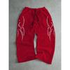 These Are Elastic Casual Retro Sports Pants with Gothic Pattern Prints, Perfect for Finding Comfortable Sports and Casual Streetwear