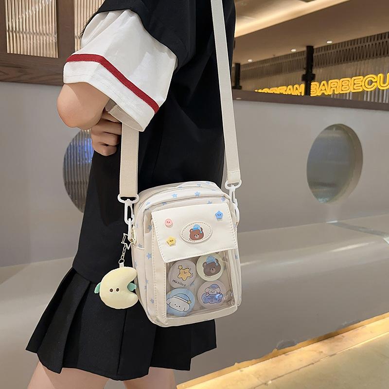 Japanese ins casual girl small bag, versatile messenger bag, cute transparent and painful bag, grain bag, mobile phone bag.
