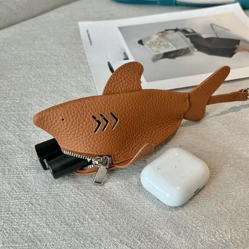 New leather dolphin change bag, keychain pendant, cute fashion earphones, lipstick storage bag.