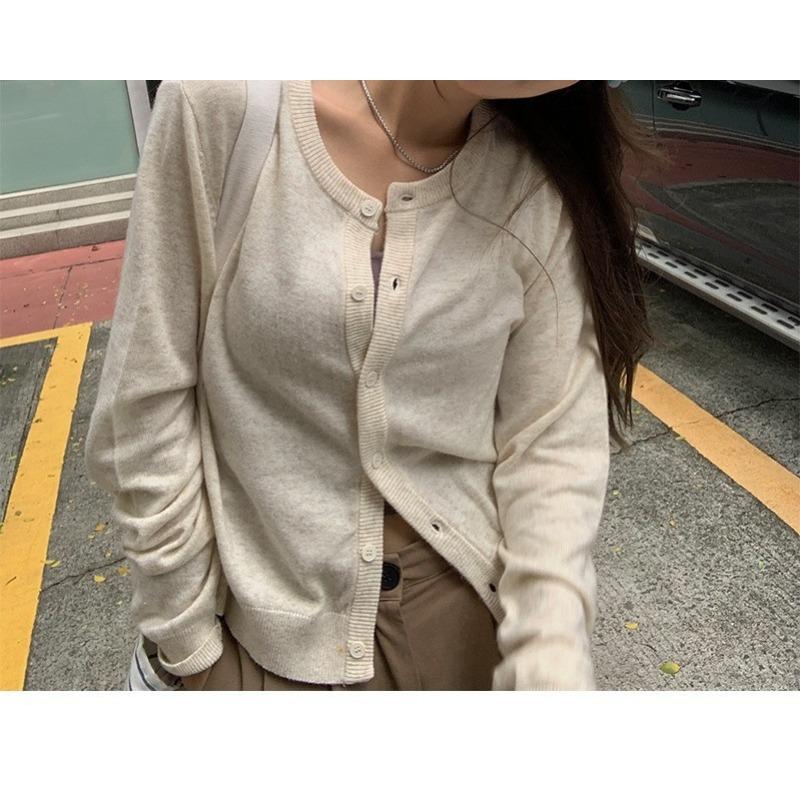 

Женский осенне-зимний однотонный вязаный кардиган с круглым вырезом на пуговицах one size fits all абрикосовый