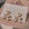 Korean Unique Pearl Bow Earrings for Women 2024 - Stylish, Versatile, and Elegant Stud Jewelry